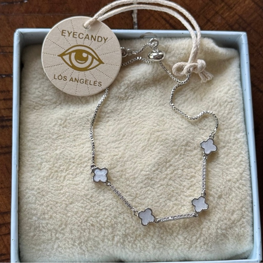 Eye Candy Silver Bracelet with White Floral Charms